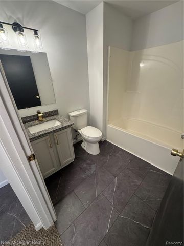 3065 Wild Orchid Lane, Burton, MI 48519