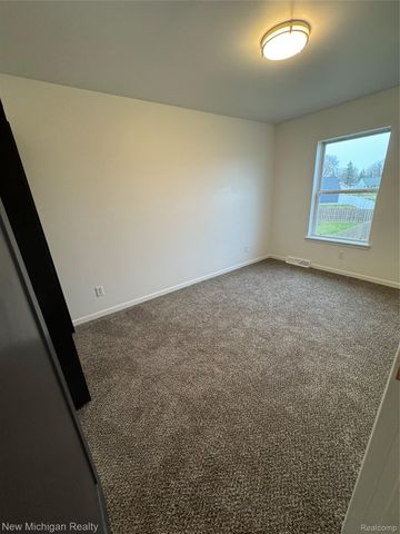 3065 Wild Orchid Lane, Burton, MI 48519
