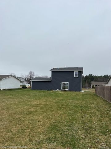 3065 Wild Orchid Lane, Burton, MI 48519