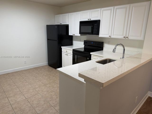 5761 Riverside Drive 304B4, Coral Springs, FL 33067