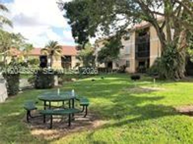 5761 Riverside Drive 304B4, Coral Springs, FL 33067