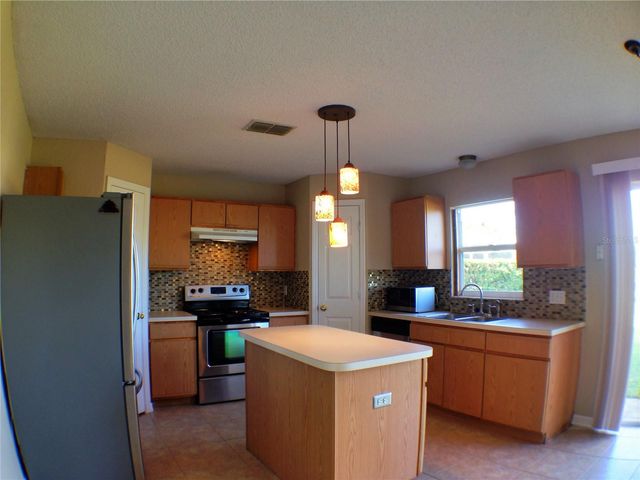 4437 STONEMEADOW DRIVE, Orlando, FL 32826