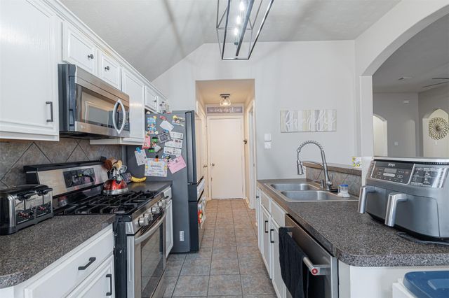 11002 Creekline Meadow Court, Cypress, TX 77429