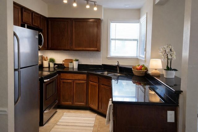 2911 ANTIQUE OAKS CIRCLE 12, Winter Park, FL 32792