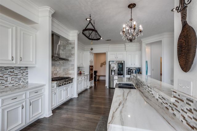 8 Cypress Point Court, Manvel, TX 77578