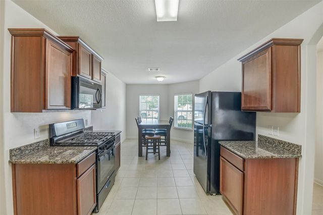 7614 Dusty Melody Lane, Conroe, TX 77304