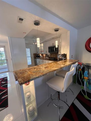 400 Golden Isles Drive 20, Hallandale Beach, FL 33009