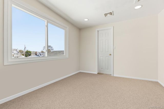 58 Wilson Avenue, Amity Harbor, NY 11701