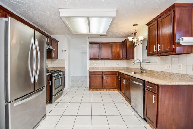 12311 Grove Meadow Drive, Stafford, TX 77477
