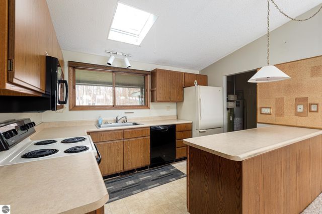 3763 East Shore Drive, Grawn, MI 49637