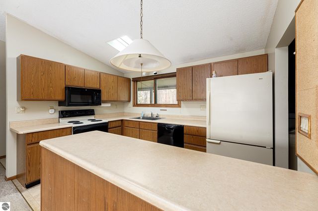 3763 East Shore Drive, Grawn, MI 49637