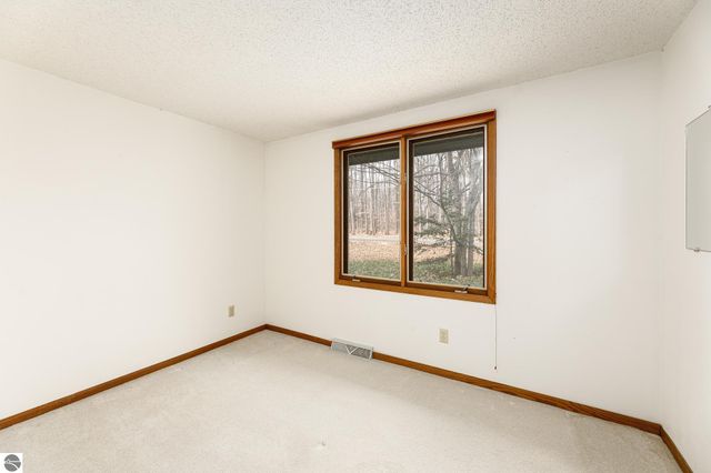 3763 East Shore Drive, Grawn, MI 49637