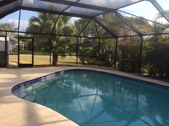 12305 Sawgrass Court, Wellington, FL 33414