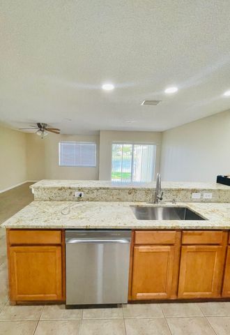 1146 Imperial Lake Road, Lake Belvedere Estates, West Palm Beach, FL 33413