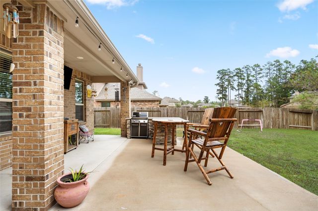 14104 N Crater Lake Court, Conroe, TX 77384