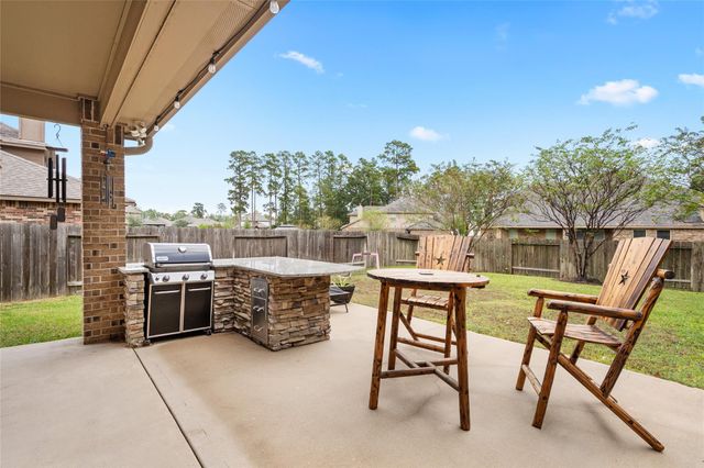 14104 N Crater Lake Court, Conroe, TX 77384