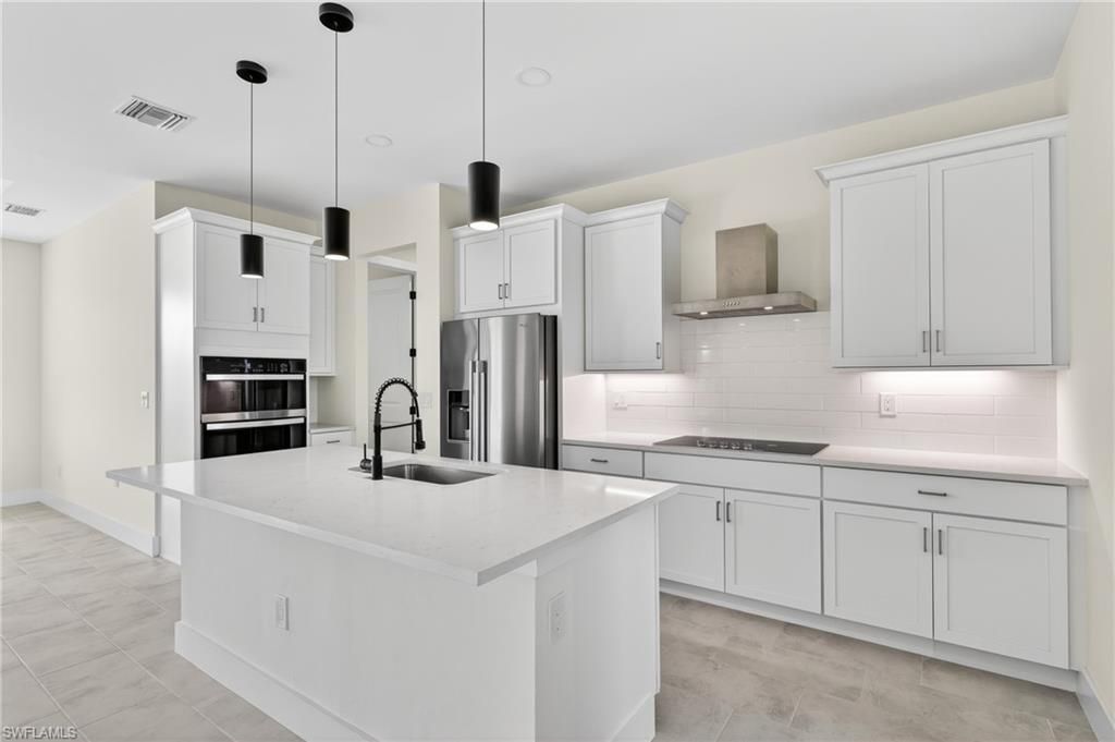 Image 10 of property listing at 817 NW 38th PL, Cape Coral, FL 33993
