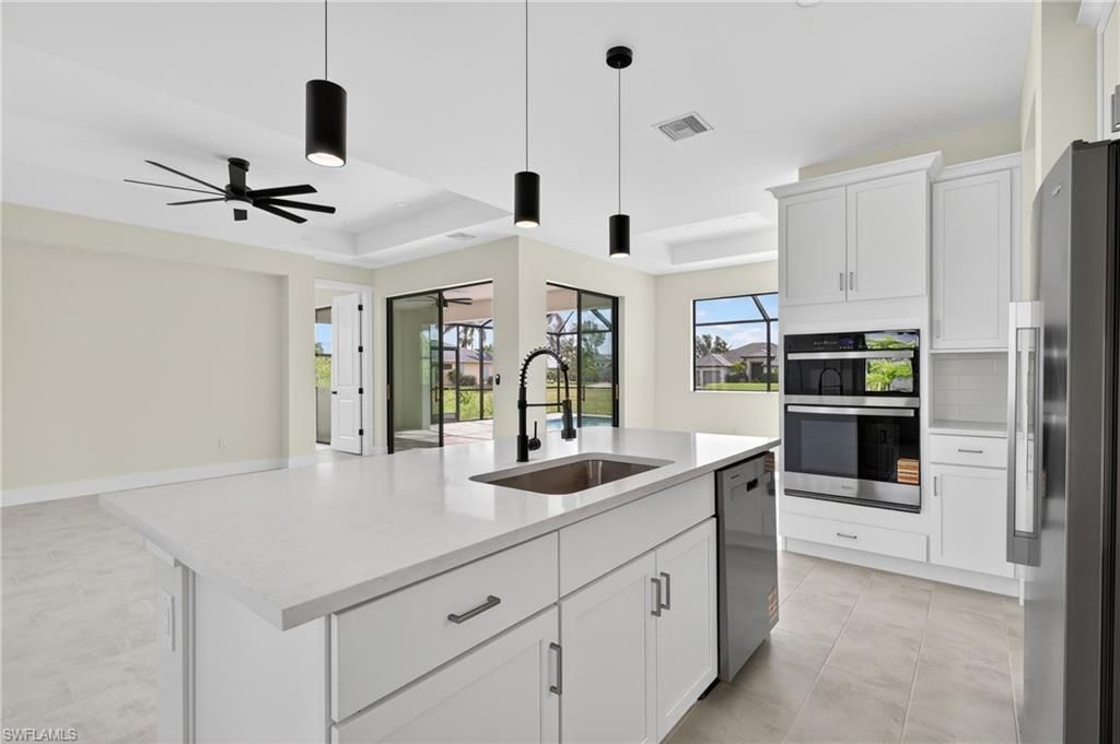 Image 13 of property listing at 817 NW 38th PL, Cape Coral, FL 33993