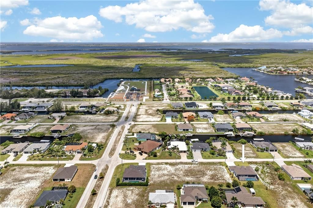 Image 2 of property listing at 817 NW 38th PL, Cape Coral, FL 33993