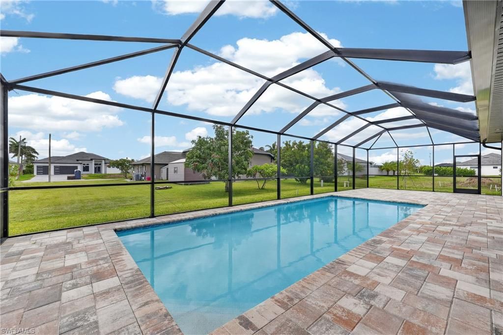 Image 3 of property listing at 817 NW 38th PL, Cape Coral, FL 33993