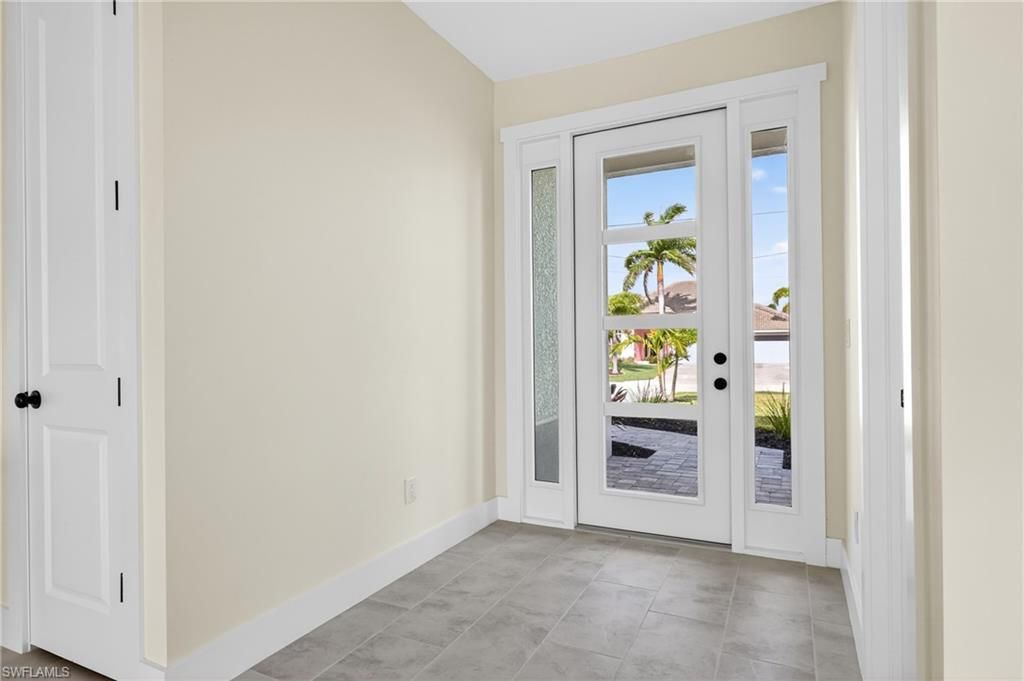 Image 4 of property listing at 817 NW 38th PL, Cape Coral, FL 33993
