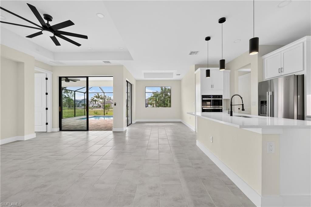 Image 5 of property listing at 817 NW 38th PL, Cape Coral, FL 33993