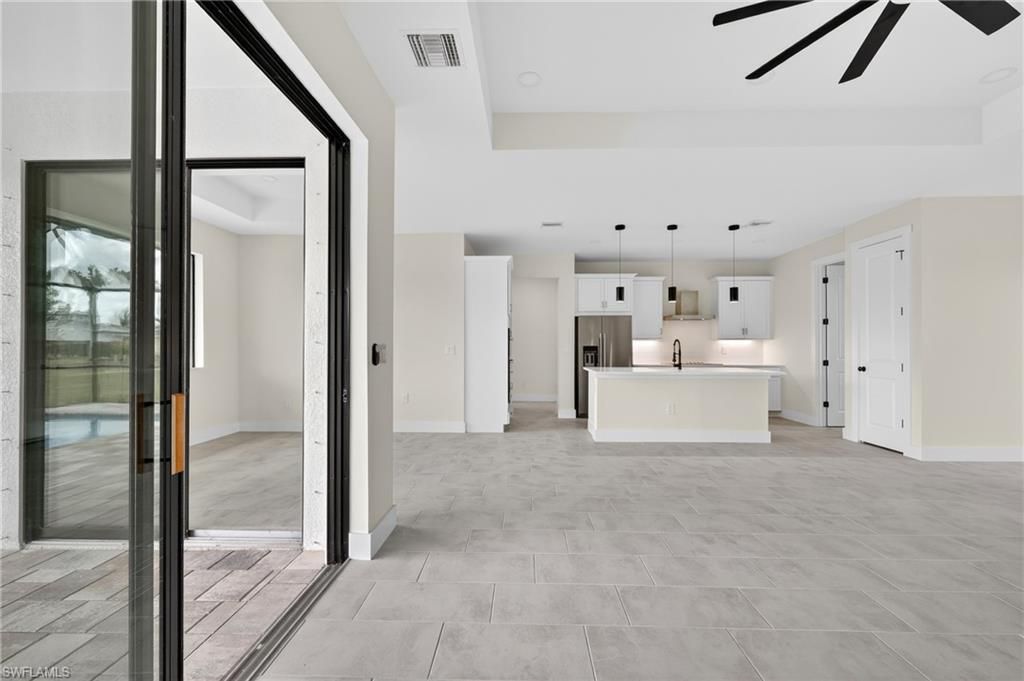 Image 6 of property listing at 817 NW 38th PL, Cape Coral, FL 33993