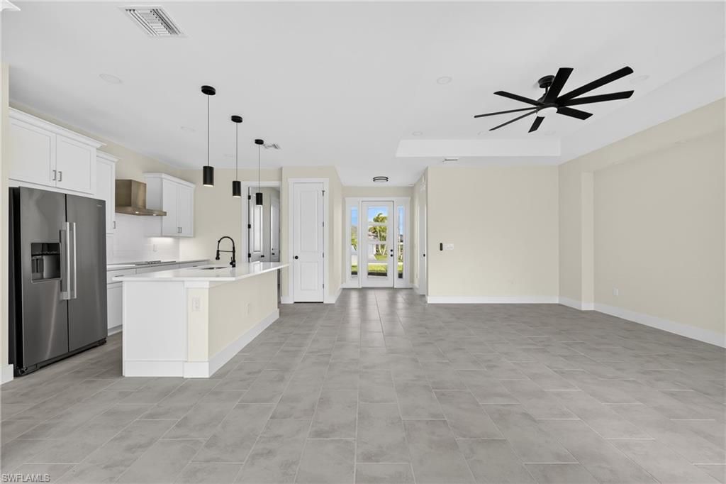 Image 8 of property listing at 817 NW 38th PL, Cape Coral, FL 33993