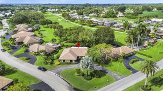 133 Clubhouse Boulevard, Atlantis, FL 33462