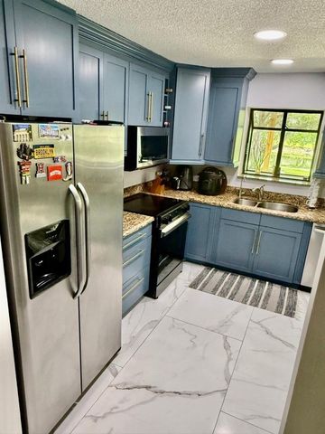 22454 Cypress Wood Lane, Boca Raton, FL 33428