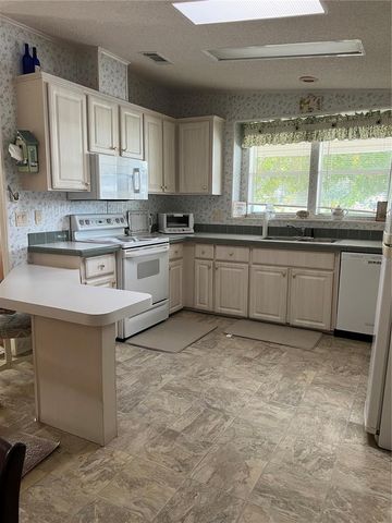 6236 KNOTTY PINE DRIVE SE, Winter Haven, FL 33884