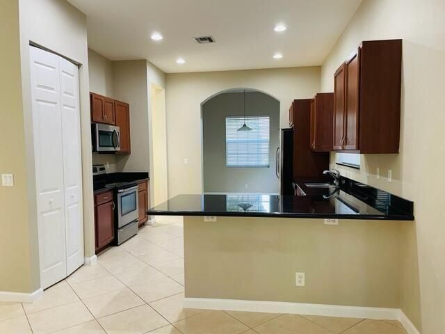 6729 Bulrush Court, Greenacres, FL 33413