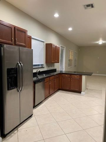 6729 Bulrush Court, Greenacres, FL 33413