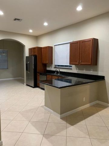 6729 Bulrush Court, Greenacres, FL 33413