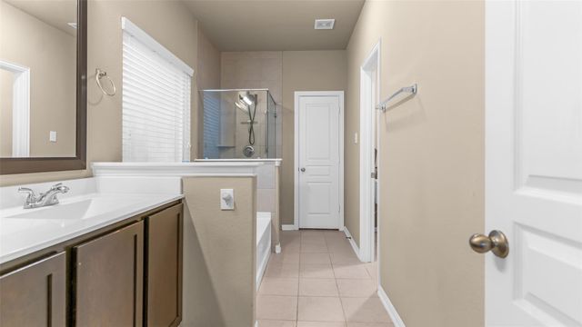 9903 Wood Wind Court, Baytown, TX 77521