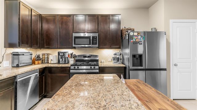 9903 Wood Wind Court, Baytown, TX 77521