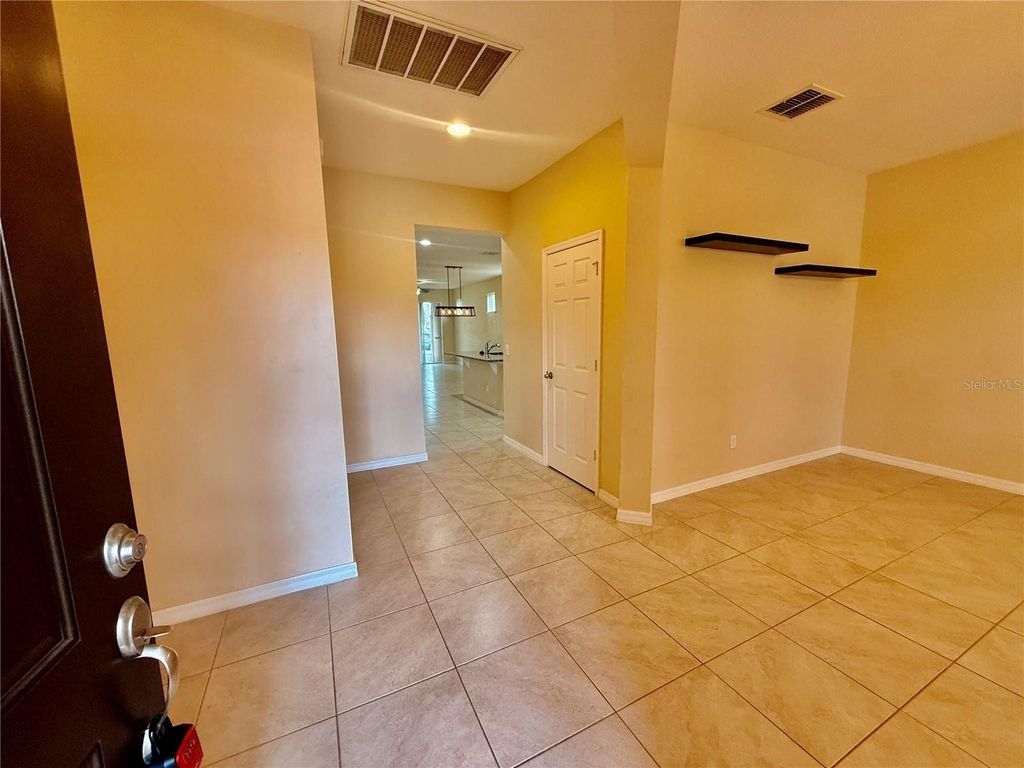 Image 5 of property listing at 12121 HOMESTEAD PARK LANE, Orlando, FL 32824
