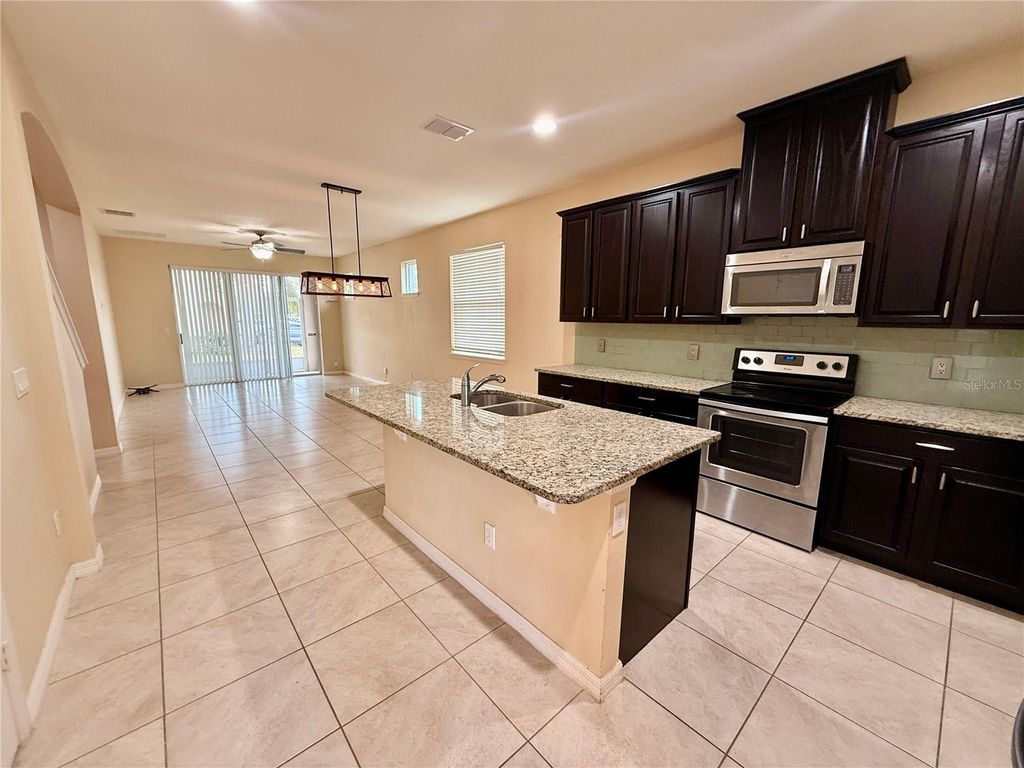 Image 7 of property listing at 12121 HOMESTEAD PARK LANE, Orlando, FL 32824