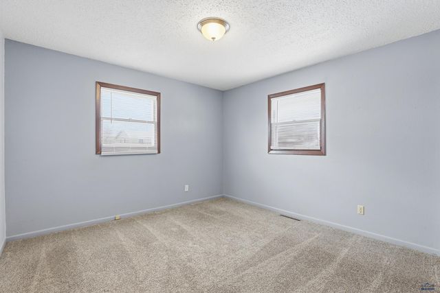 201 HUMMINGBIRD CIR, Box Elder, SD 57719