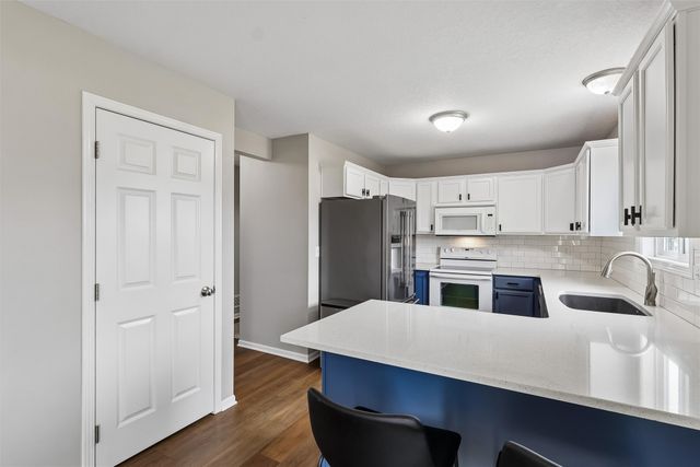 2441 Pine Court, Van Meter, IA 50261