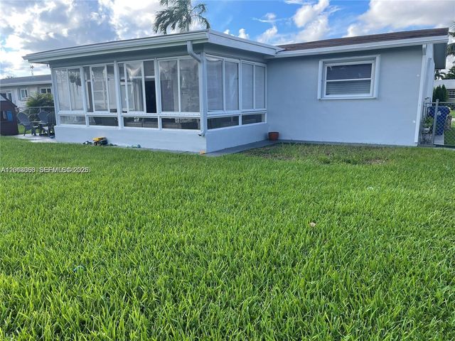 9590 NW 24th Pl, Sunrise, FL 33322