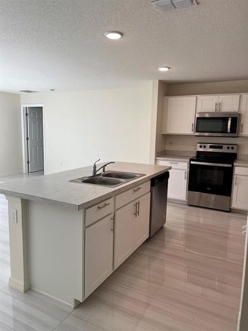 1714 SW Haylake Ave, Port St Lucie, FL 34953