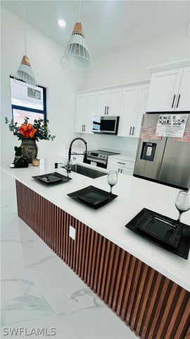 2614 12th ST SW, Lehigh Acres, FL 33976