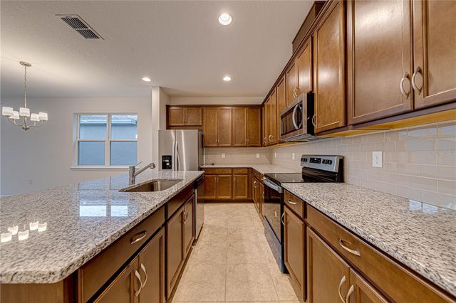 4454 DAVOS DRIVE, Clermont, FL 34711