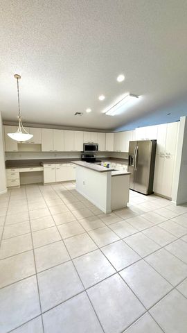 6166 Cotton Rose Lane, Lake Worth, FL 33467