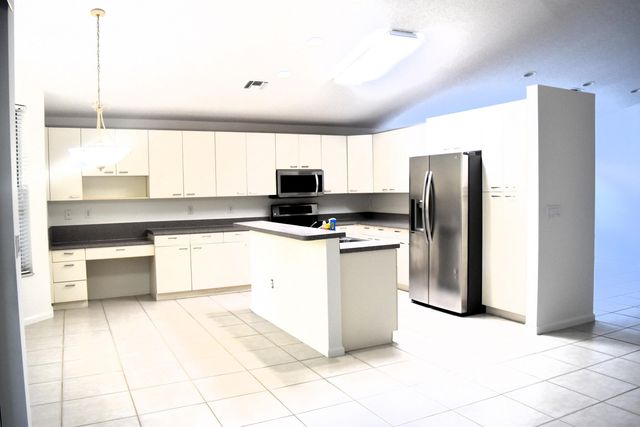 6166 Cotton Rose Lane, Lake Worth, FL 33467