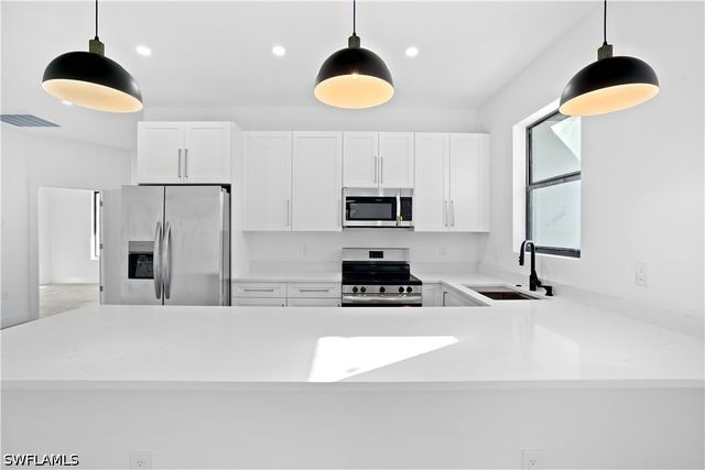 1122 Craft ST E, Lehigh Acres, FL 33974