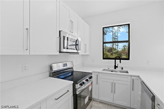 1122 Craft ST E, Lehigh Acres, FL 33974