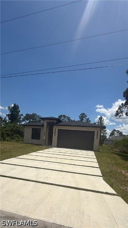 1122 Craft ST E, Lehigh Acres, FL 33974