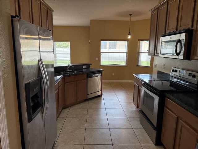 7101 WHITE TRILLIUM CIRCLE, Orlando, FL 32818